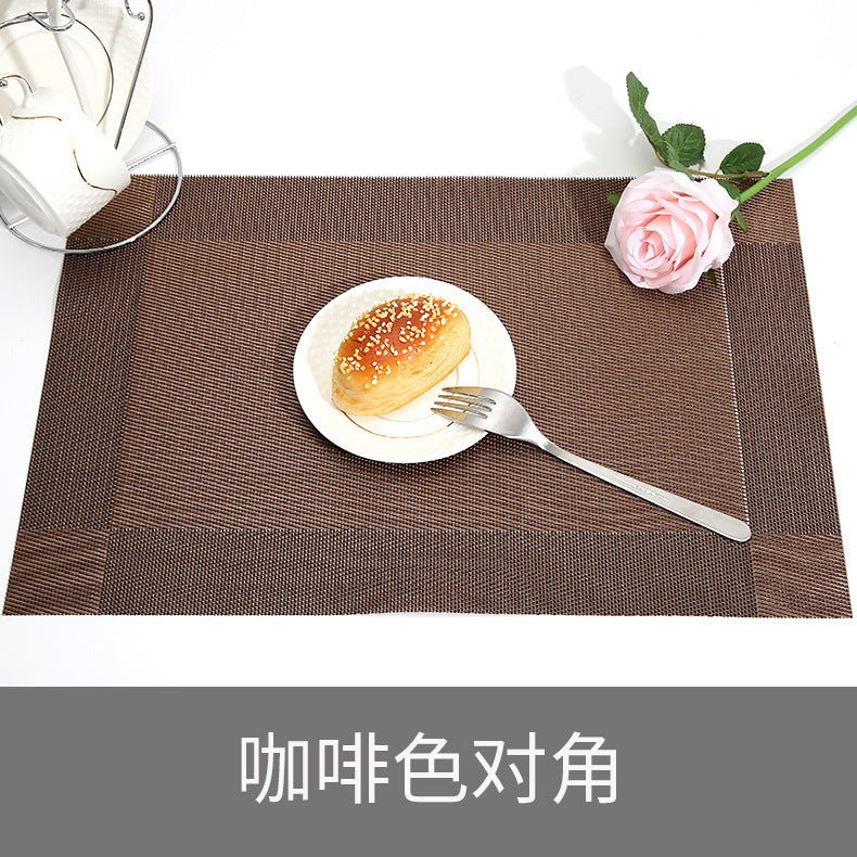 Amazon Hot Selling  Woven Plastic Restaurant Table Mats Anti Slip Heat Resistance Dining Table Mat Set PVC Placemats baby magazin 