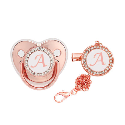Cross-border e-commerce hot style 26 rose gold letters baby play mouth baby pacifier with dust cover baby magazin 