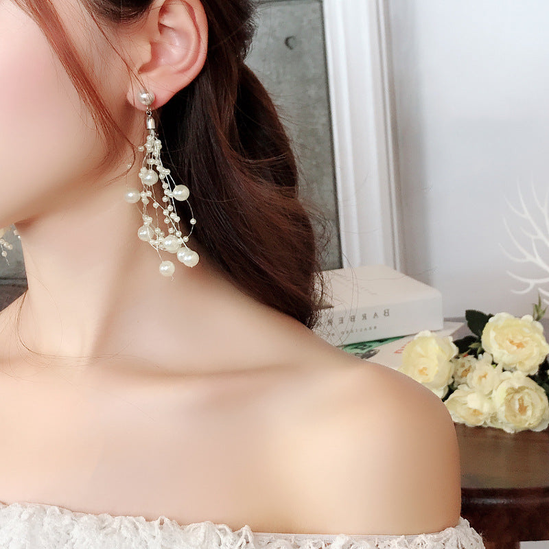 Multi-pearl tassel size bead fish line earrings personality wild temperament long earrings Korean fashion ear baby magazin 